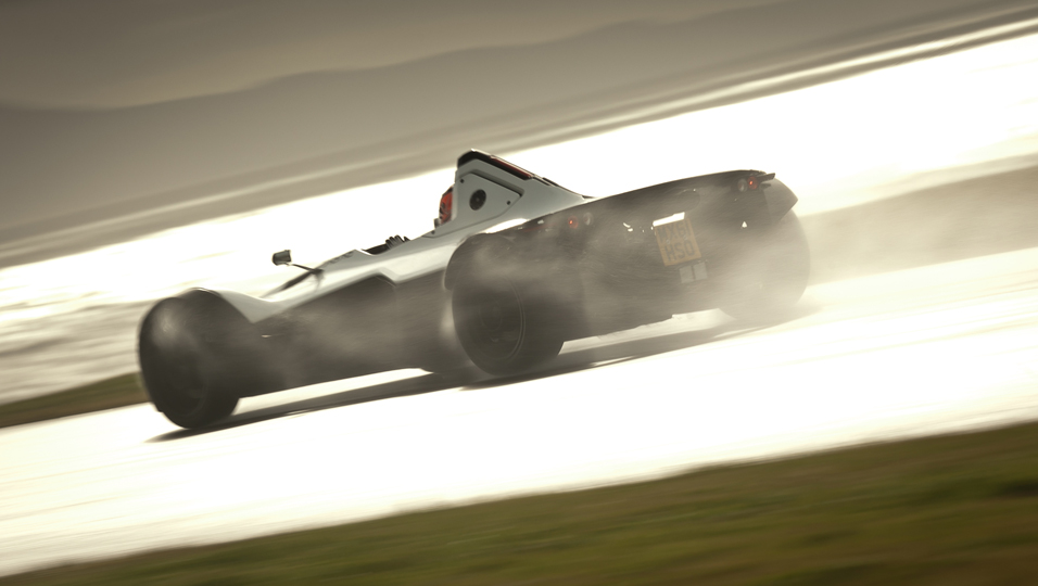kicking up dirt driving on track